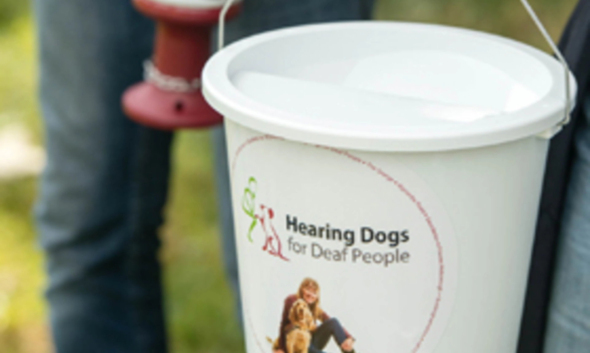 A hearing dogs collection bucket
