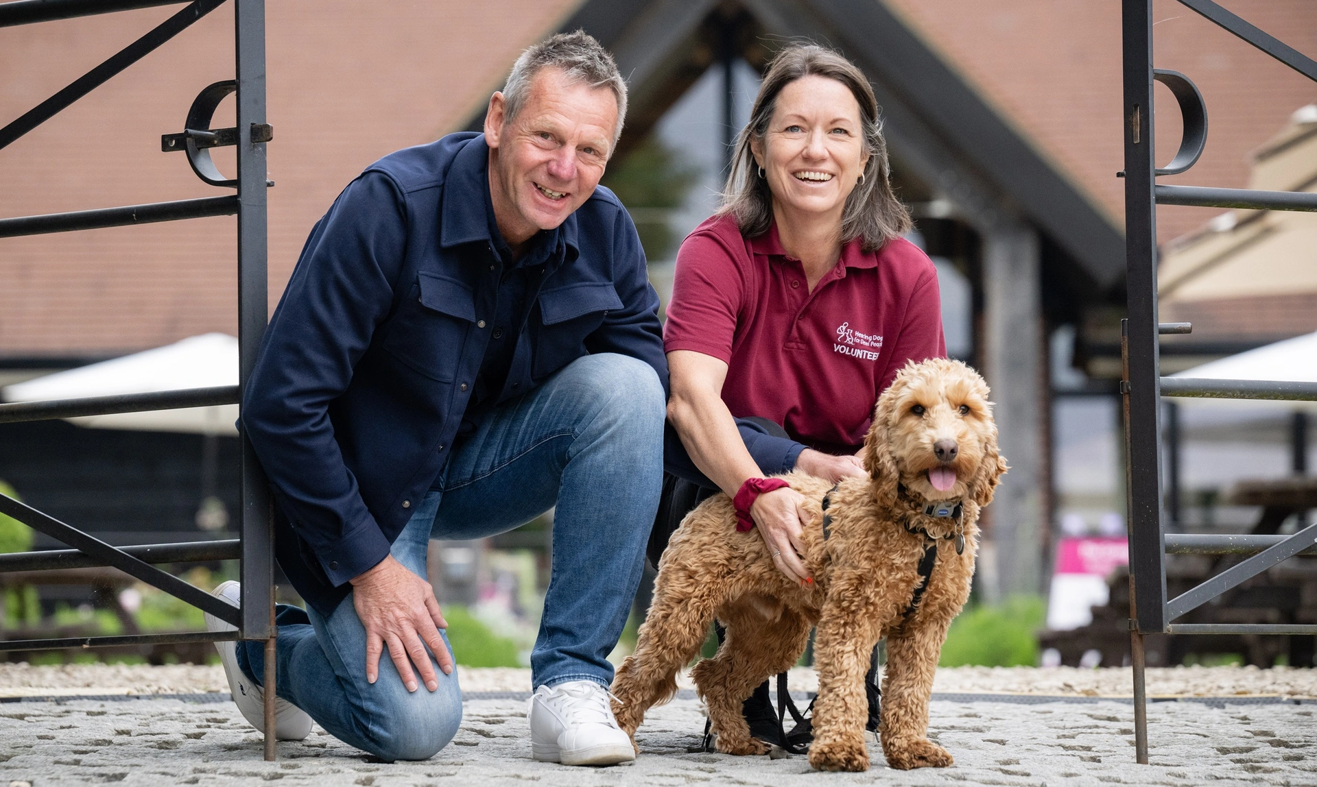 Stuart Pearce hearing links trainer and puppy
