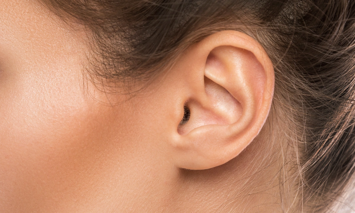 Close up of a human ear and side of face 