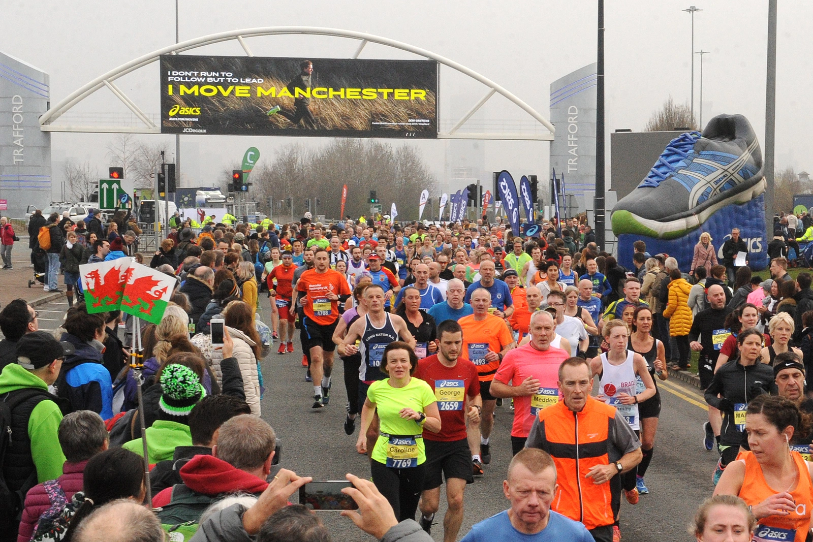 A large group of runners and spectators photographed at the manchester marathon