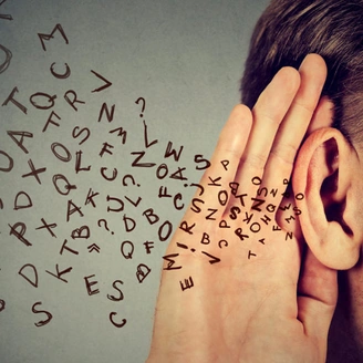 graphic showing a person cupping their hand behind their ear with lots of written letters streaming into the ear.