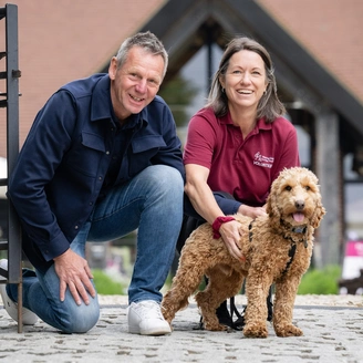 Stuart Pearce hearing links trainer and puppy